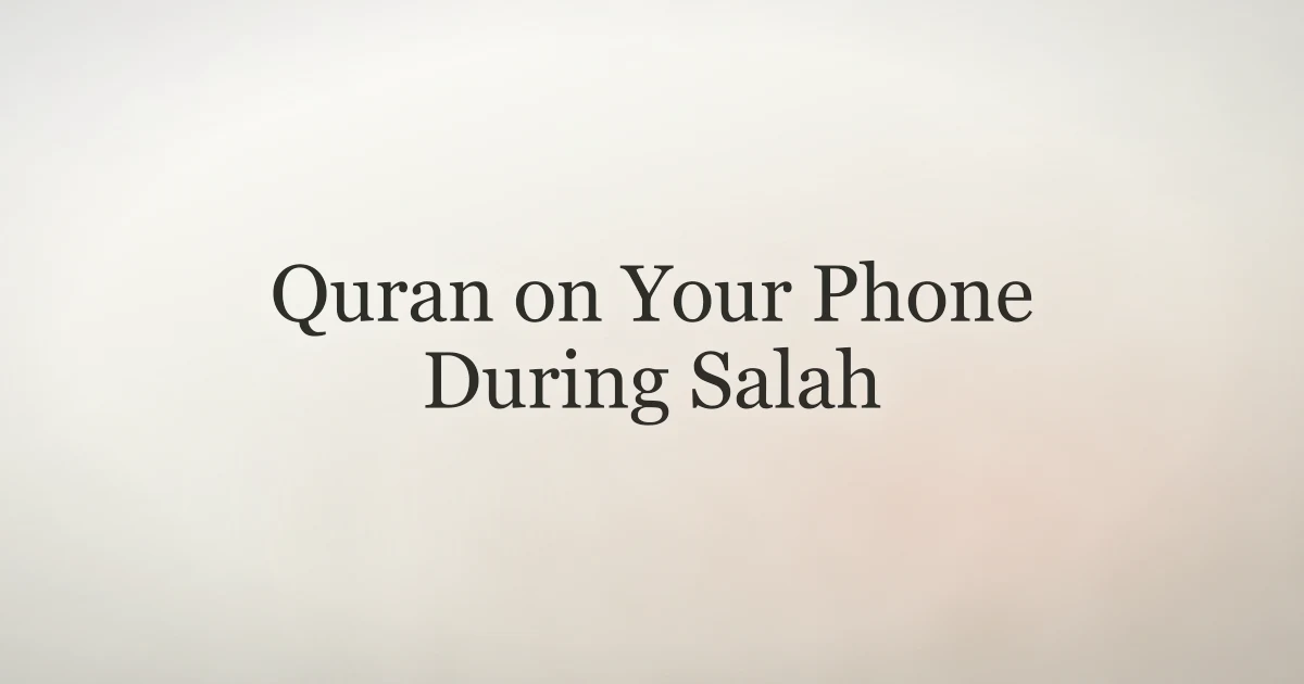 Muslim asking whether a Quran app can be held during salah